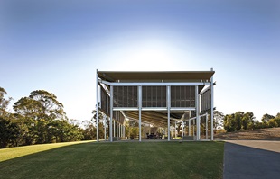 Kennedy says the building has a unique and deliberate presence, similar to the Acropolis in Athens or a praying mantis climbing over the hill